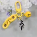 Gelber Legierung Schlüsselanhänger Taschenschmuck mit Glocke und Kristall Feder Anhänger. - Stil 2