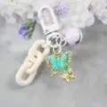 Kleurrijke vlinder sleutelhanger met witte ketting en bel stijlvolle tassenhanger - Stijl 4