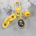 Yellow alloy keychain featuring a cute rose cameo pearl pendant and bell bag charm ornament - Style 1 / Yellow