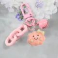 Roze hars schattige wolk sleutelhanger variant met grove ketting en een bel. - Stijl 4