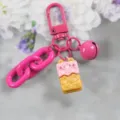 Cute pink cartoon resin waffle biscuit keychain with bell and chain accessory variant. - Style 8