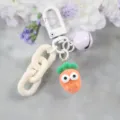 Cute cartoon carrot keychain with bell and resin pendant, stylish accessory for bags and keys. - Radish Keychain (Style 4)