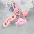 Cute pink cartoon pig charm keychain with bell and chain link, sweet resin accessory for bags. - Style 10