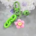 Süßer Harz Blumen Schlüsselanhänger mit grünem Karabiner Kette Glocke, bunter Cartoon Taschenanhänger - Lächeln Blume Schlüsselanhänger (Stil 9)
