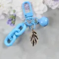 Blue metal keychain with leaf pendant, chic fashion charm accessory for bags and keys. - Style 7