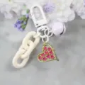 Stylish white keychain with purple bell and sparkly pink heart pendant for daily use - Style 3
