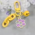 Cute yellow honeycomb keychain with bell and glitter pendant, stylish candy color bag charm. - Style 2