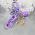 Paarse metalen sleutelhanger met strass maan hanger, schattige bel en dikke ketting. - Stijl 9