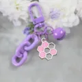 Purple candy color keychain featuring honeycomb pendant, bell, and cute chunky chain link. - Style 11