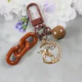 Bruine ketting sleutelhanger met strass eenhoorn maan hanger en schattig bel accessoire - Stijl 17