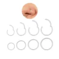 Details of 8pcs stainless steel segment rings set showing various sizes and nose wear closeup. - 1.0mm / 8 Pcs E