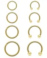 Detail view of 8-piece gold piercing set, featuring seamless rings and horseshoe barbells in grad. - Silver