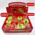Detailansicht von tomatenförmigen Squishy-Spielzeugen zum Stressabbau im Displaykarton - Große Tomate (Display-Box) / 12er Set