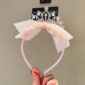 Exquisite detail of children's princess crown headband with pink bow, pearls and rhinestones. - L2-3 Headband / Pink