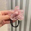 Coletero rosa de organza con flor, elegante coleccion de tela transparente para el cabello. - Coletero / Fucsia