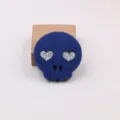 Blue felt skull accessory with glitter heart eyes, perfect for DIY Halloween crafts and decor. - Dark Blue
