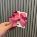 Zweifarbige magenta Ripsband Schleifen Haarklammer für Mädchen, süßes 3D Haarschmuck Modell. - Fuchsia