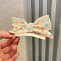 Cream white polka dot bow hair clip for kids, cute fabric hair barrette with card display. - Sunflower Yellow