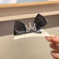 Black satin bow hair clip with rhinestone crown design, perfect for cute girls and kids daily wear. - Hair Clip Style / Black