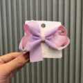 Zweifarbige Schleifen-Haarspange, süßes Haaraccessoire in Lila und Rosa für Kinder. - Violett