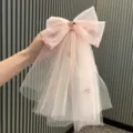 Pink mesh bow hair clip for kids, cute fairy princess hair accessory with tulle veil. - 1-2 Pieces / Pink