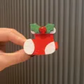 Weihnachts-Haarspange aus Filz, rot-weißer Strumpf mit grünen Blättern, festliches Haaraccessoire. - Scharlachroter Haarschnitt