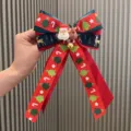 Festive Christmas bow hair clip featuring cute Santa and reindeer for winter holiday styling. - Duckbill Hair Clips / Rouge Red