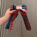 Pince à cheveux nœud à carreaux de Noël avec pendentif ours et Père Noël, accessoire festif femme. - Aqua
