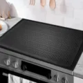 Gran protector de cubierta de estufa de silicona negra y estera aislante termica para cocina. - 70*50cm / Negro