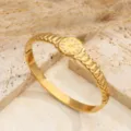 Orologio bracciale rigido in acciaio dorato da donna, elegante gioiello di moda minimal. - Orologio Oro
