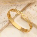 Bracciale rigido geometrico in acciaio inossidabile dorato con maglie a V, lusso. - Forma a V Oro