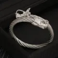 Bracciale rigido da uomo in acciaio inossidabile con testa di drago doppio intrecciato. - Colore acciaio