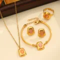 Elegant gold titanium steel jewelry set with pink stone pendant and matching fashion accessories. - Style 02 / Pink
