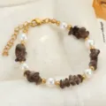 Elegante pulsera de perlas y piedra natural con cadena dorada para mujeres estilo verano. - Adorno de Perlas / Gris