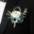Artificial white rose boutonniere with blue flowers for wedding groom suit decoration. - Type E (Corsage)