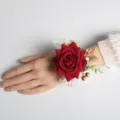 Red artificial rose wrist corsage for wedding party, elegant floral bracelet accessory. - Red Wrist Corsage