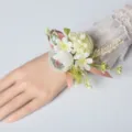 Stunning wedding wrist flower corsage with pink ribbon and delicate white artificial flowers. - Wrist Corsage / Light Bean Paste