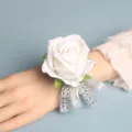 Elegant white rose wrist corsage with silver ribbon and rhinestones for wedding party. - Wrist Corsage / White