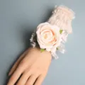 Elegant wedding wrist flower with pink rose and lace cuff for bridal party and bridesmaids. - Wrist Corsage / Champagne