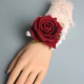 Elegant red rose wrist corsage with lace cuff for wedding bride bridesmaid party decor. - Wrist Corsage / Burgundy