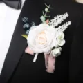 Elegant white artificial rose boutonniere with berries and pink ribbon for retro wedding. - Off-White Boutonniere