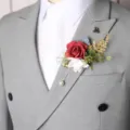 Elegant wedding boutonniere set with artificial red and white roses, greenery, and pearl pin. - 8x12cm / Style 5