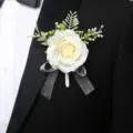 Elegant artificial white rose boutonniere with green leaves and ribbon for wedding and prom suit decor. - Style 8 Boutonniere