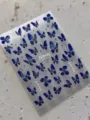 Blue holographic butterfly nail art stickers with 3D embossed stars for manicure designs. - YT8766 Pro / Blue