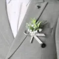Elegant artificial lily of the valley boutonniere with grey ribbon for wedding business events. - Style 5
