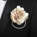 Elegant wedding floral boutonniere with artificial fabric flowers and pearl chain decoration. - Type E (Corsage)