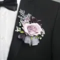 Elegant artificial rose boutonnière for wedding party groom and guest suit decoration. - Purple Boutonniere