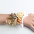 Corsetto da polso artificiale rosa champagne con nastro rosa per matrimonio e sposa - Fiore da Polso Champagne