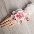 Pink artificial rose wrist flower for wedding bridal corsage with white ribbon bow decor. - Medium Pink Wrist Corsage