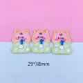 Détail de pendentif ours cartoon en acrylique avec design transparent double face et contour. - Ours Jaune